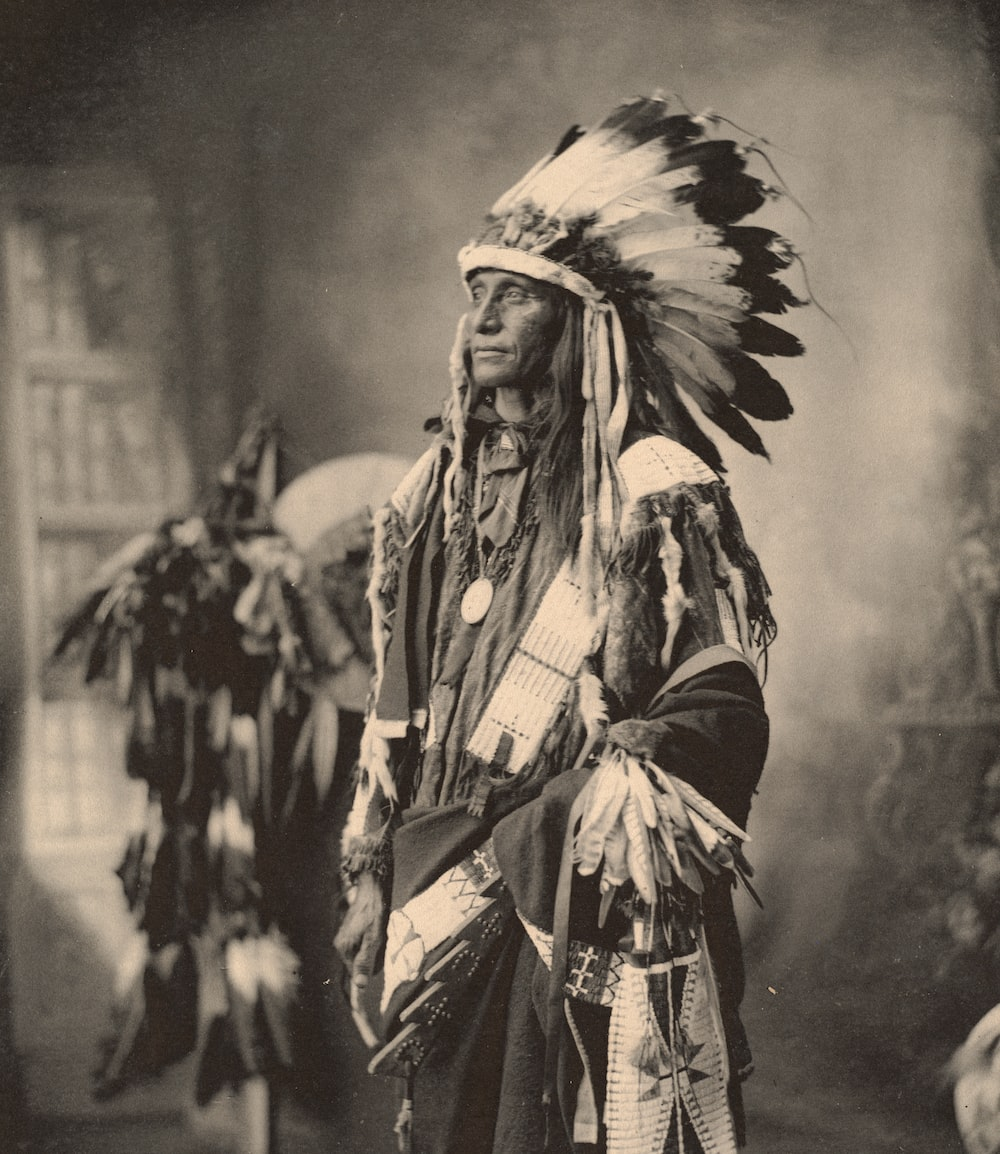A grey-scale photograph of a Native American