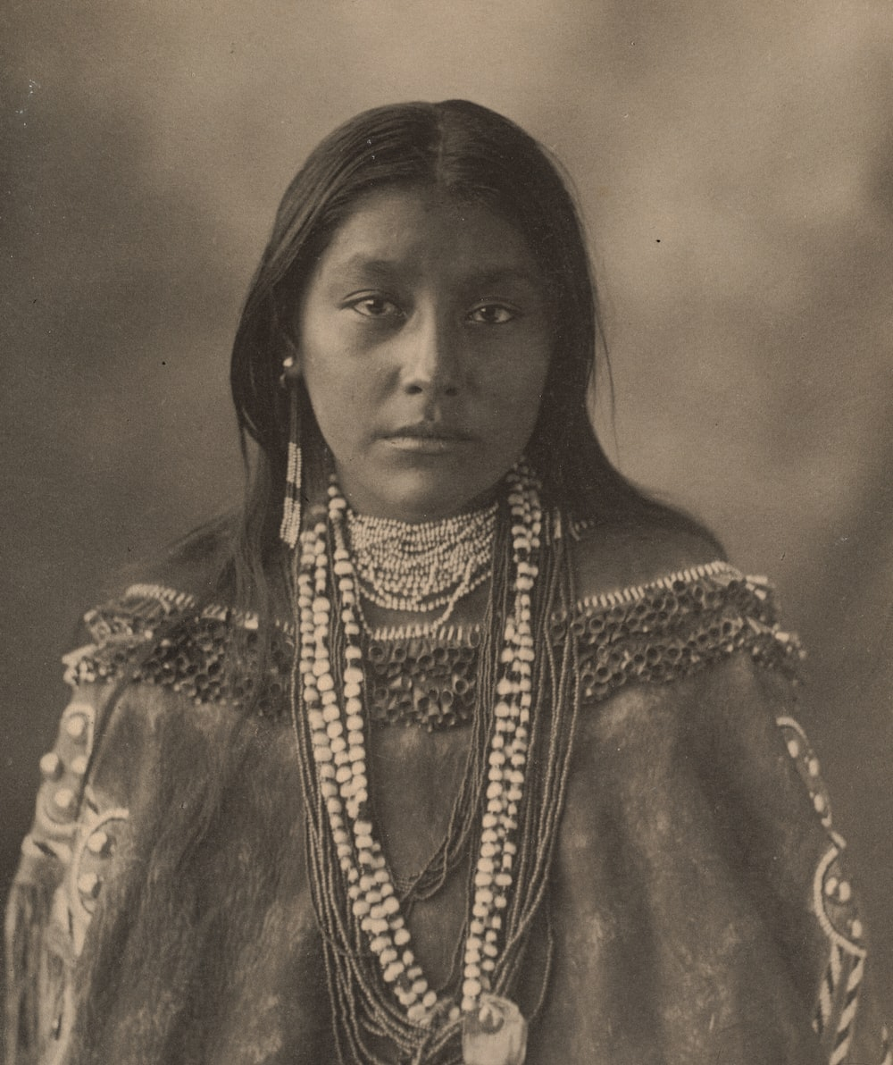 A grey-scale photograph of a Native American woman