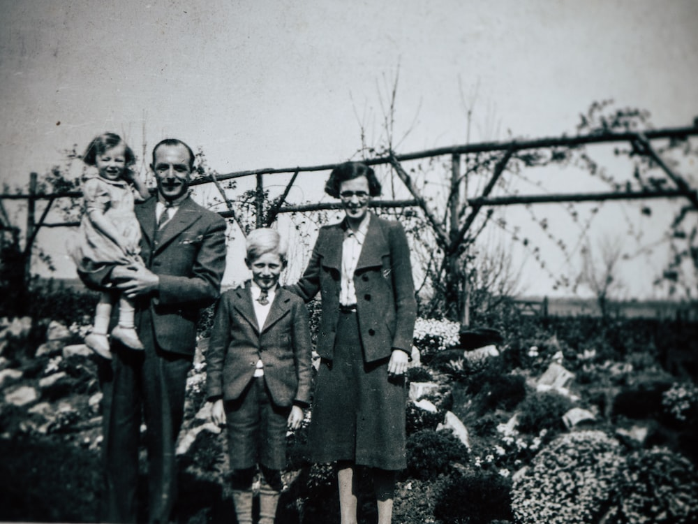 An old family photograph taken outdoors 
