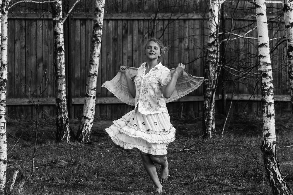 An old black and white photograph of a young girl