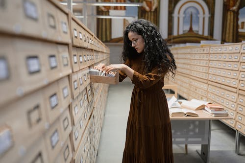 A person exploring an archive