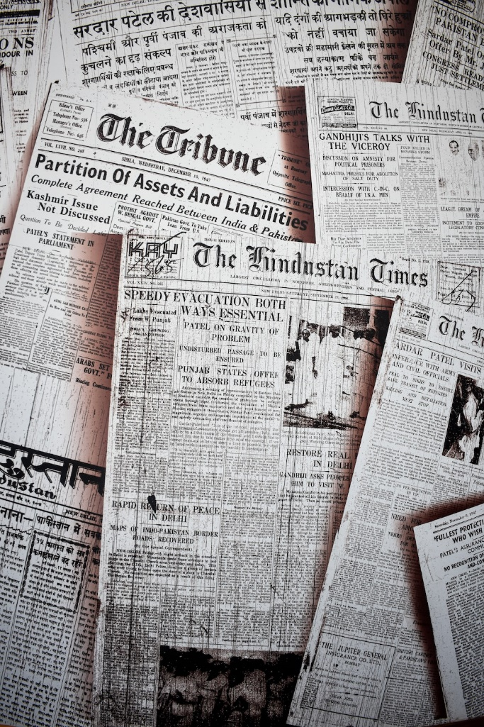 A very old, partially torn newspaper