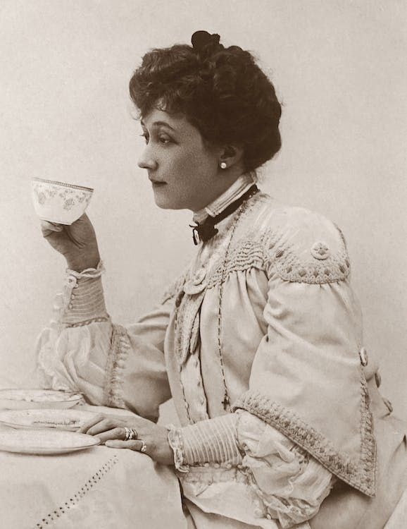 A person drinking tea