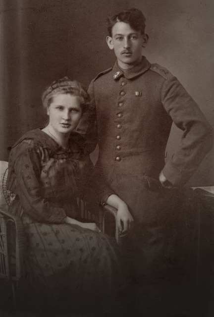 A greyscale photograph of a couple   
