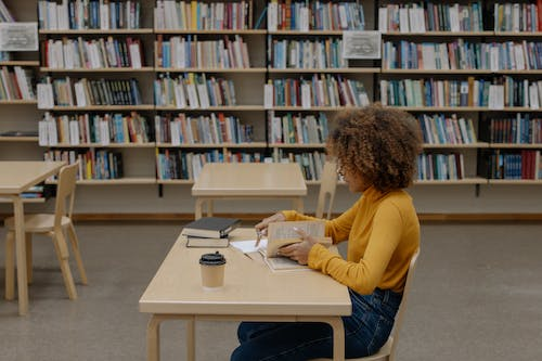 A person sitting in a library