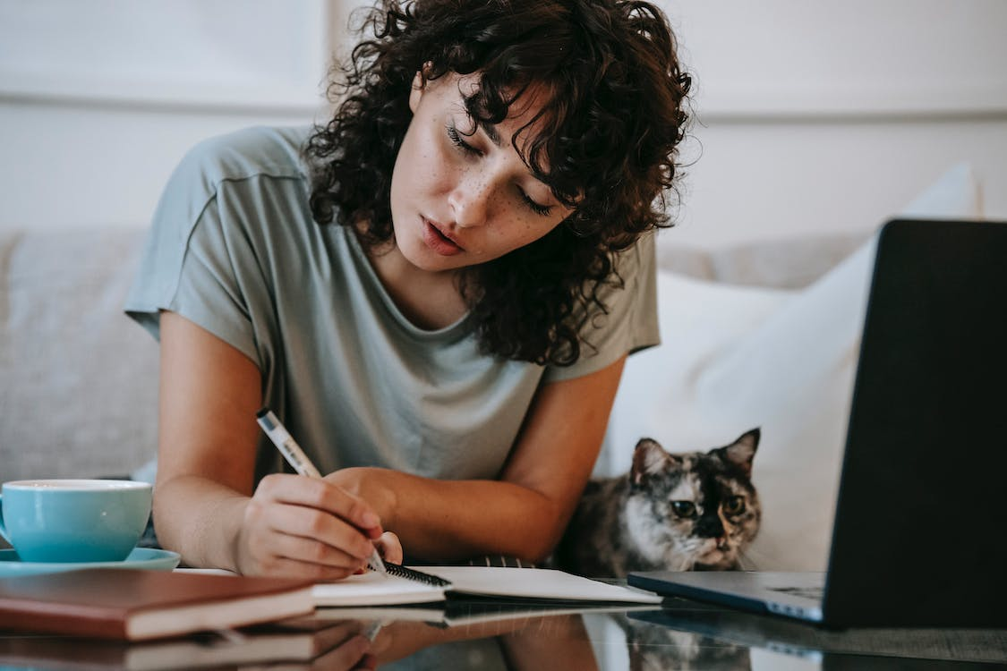 A person finding family history through genealogy research to write a genealogy memoir
