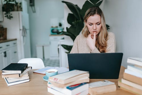 A person finding family history through genealogy research to write a genealogy memoir
