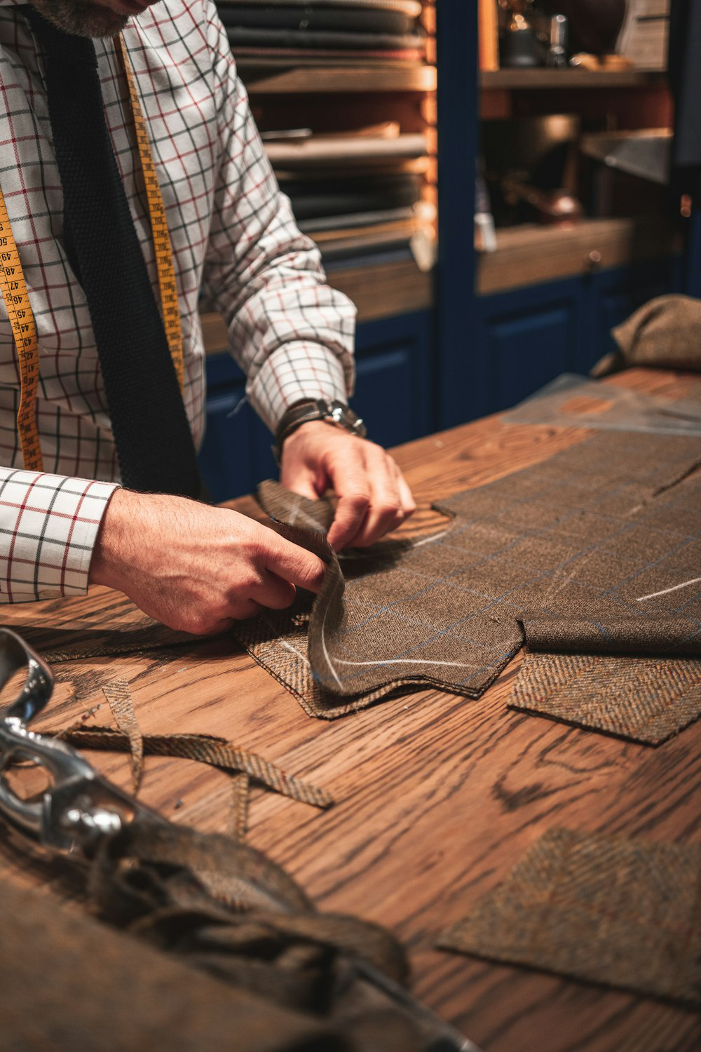 a tailor working with fabric.