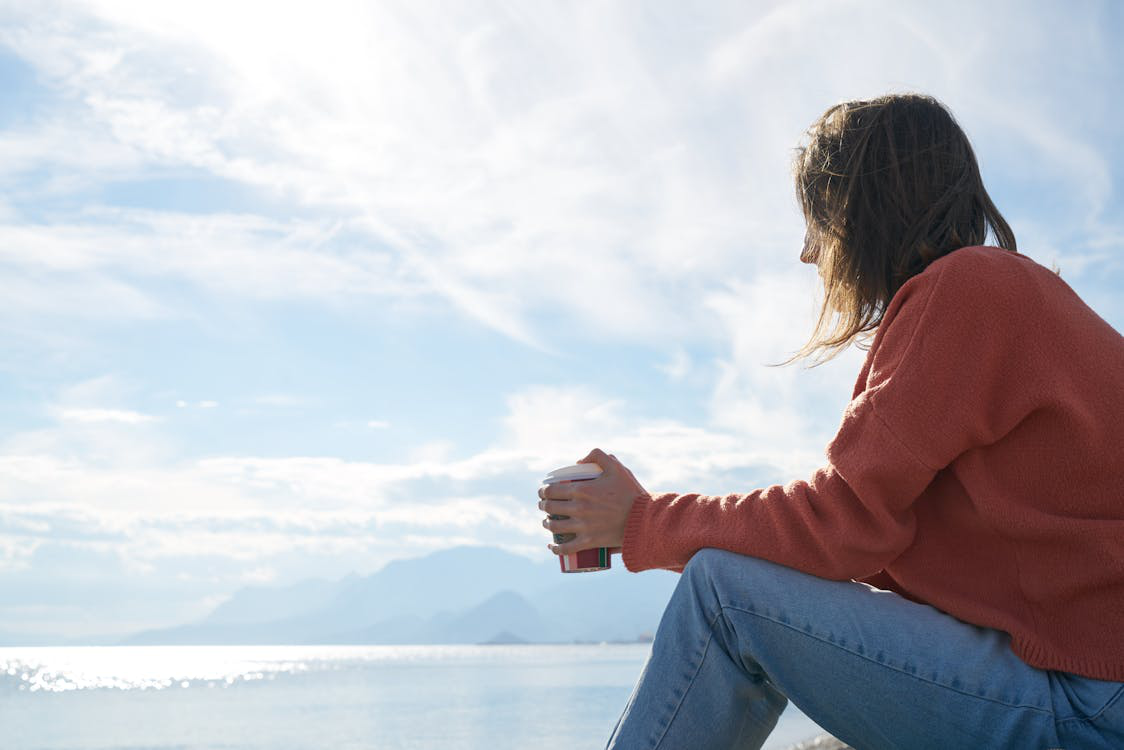 a woman reconnecting with nature.
