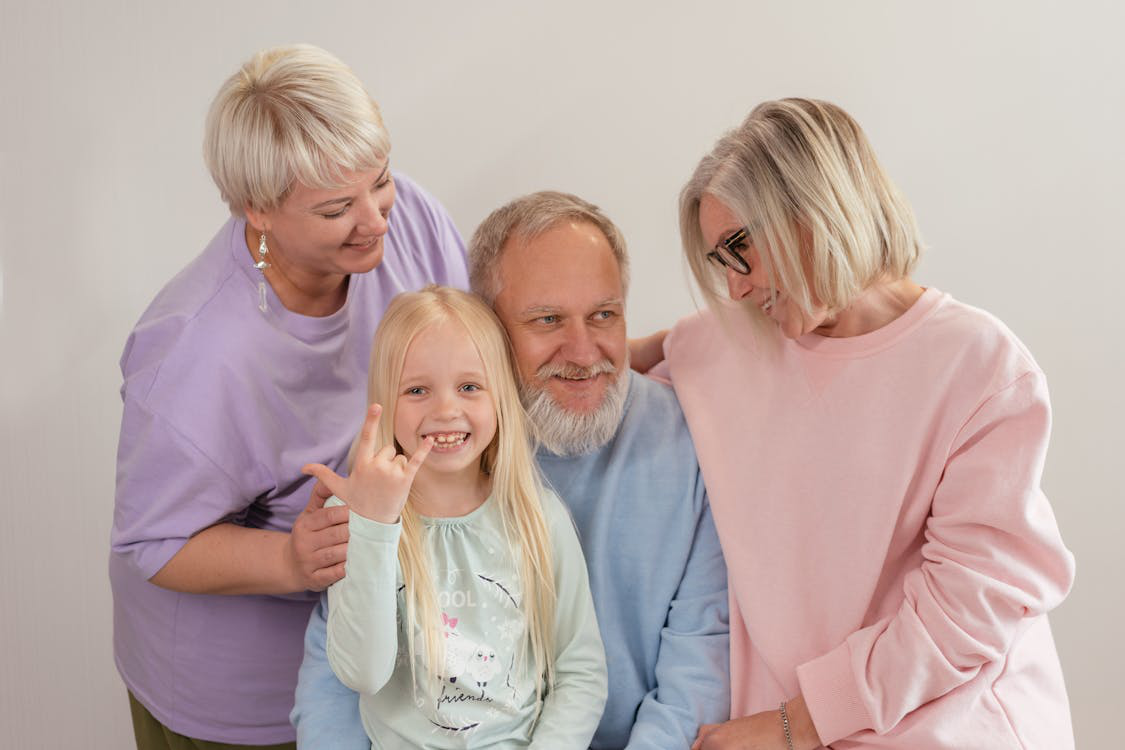 a grandchild with her grandparents.