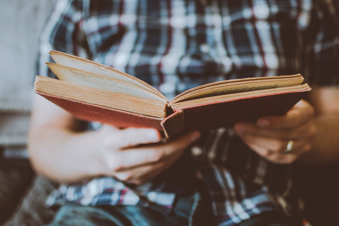 a person reading a book.