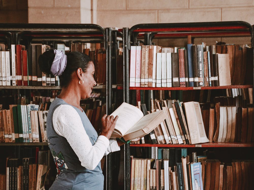 a woman holding a book.