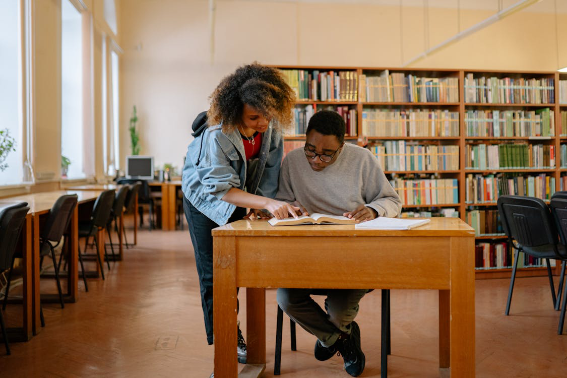 two people at the library.