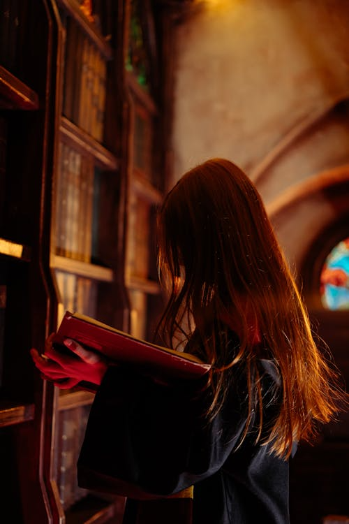 a woman holding a book