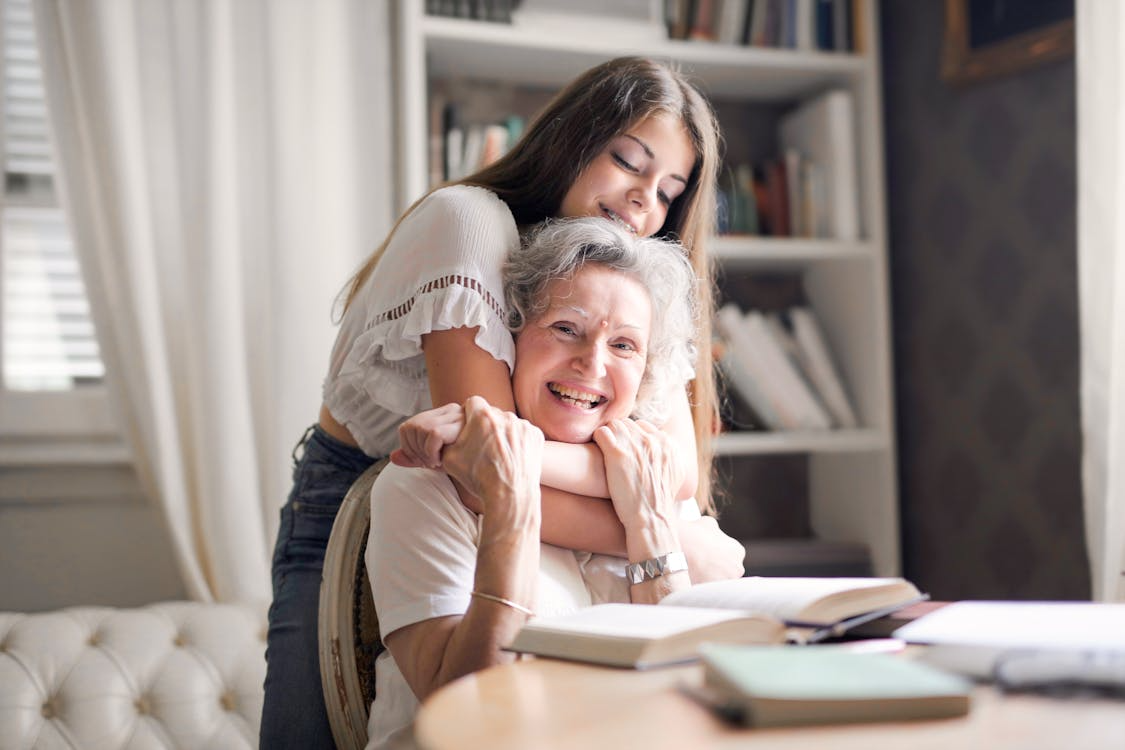 a girl with an elderly woman.