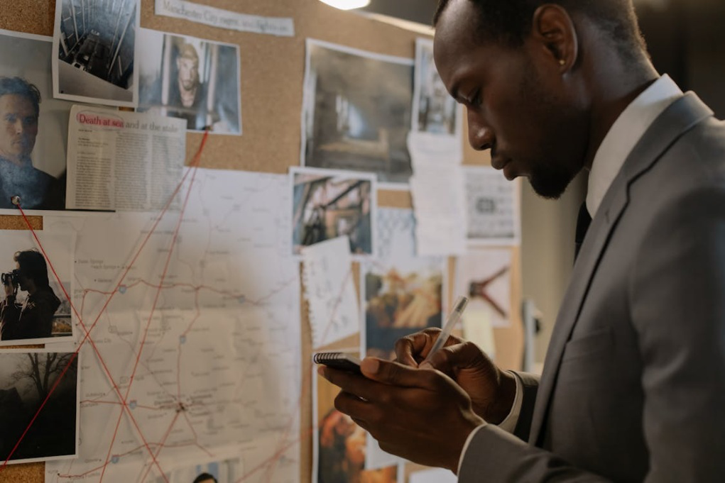 a man taking notes.