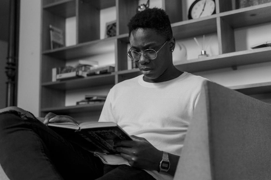 a man reading a book.