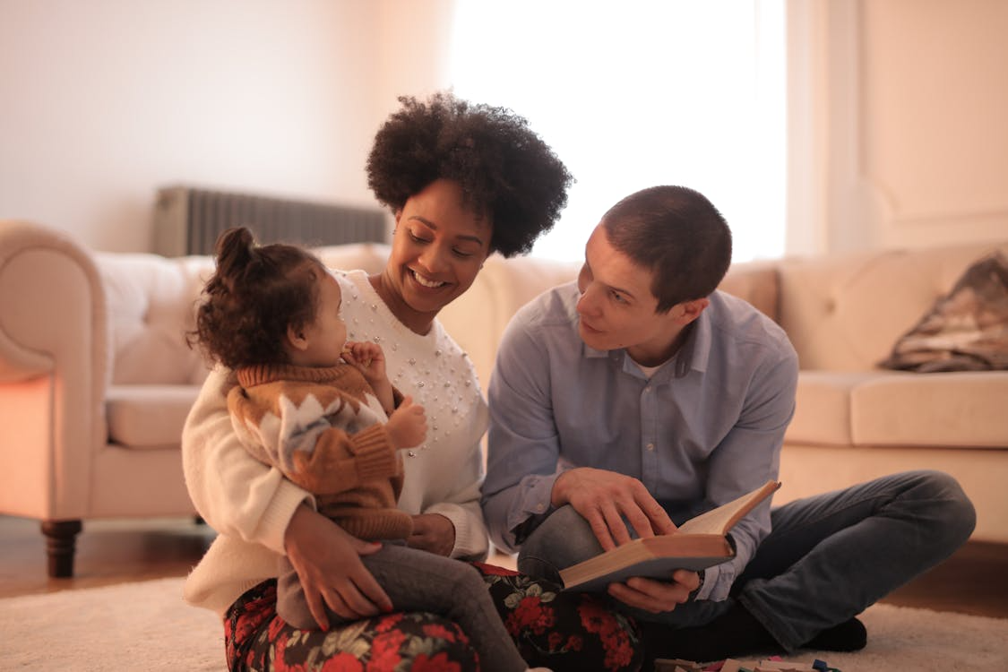 a family sitting together.