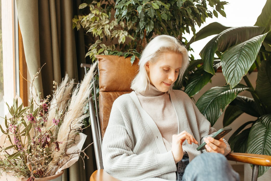 a woman sitting in a chair.