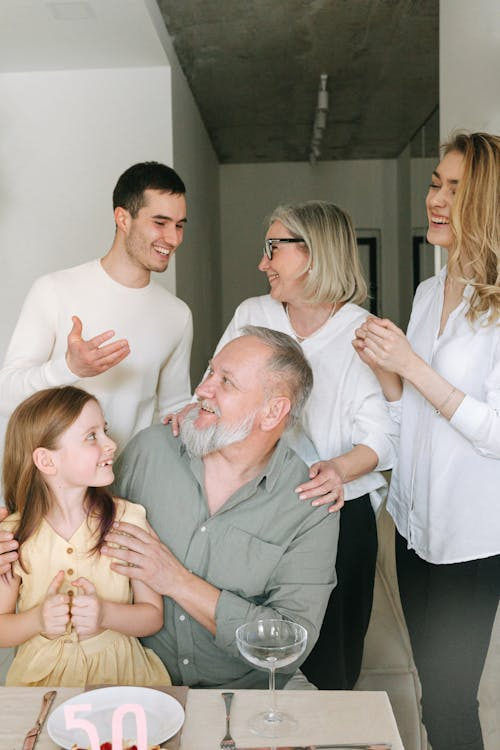 a family gathered in one room.