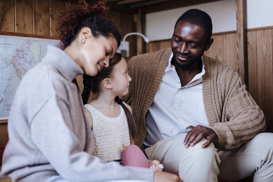 a family sitting together.
