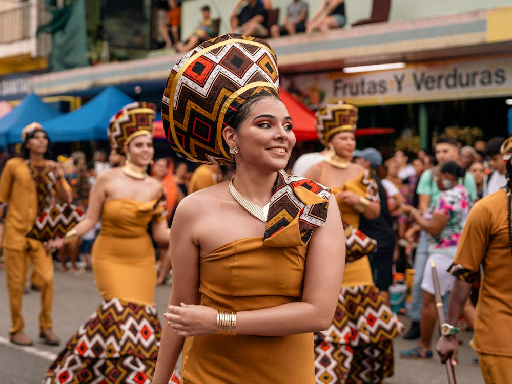 a woman dancing at a festival.