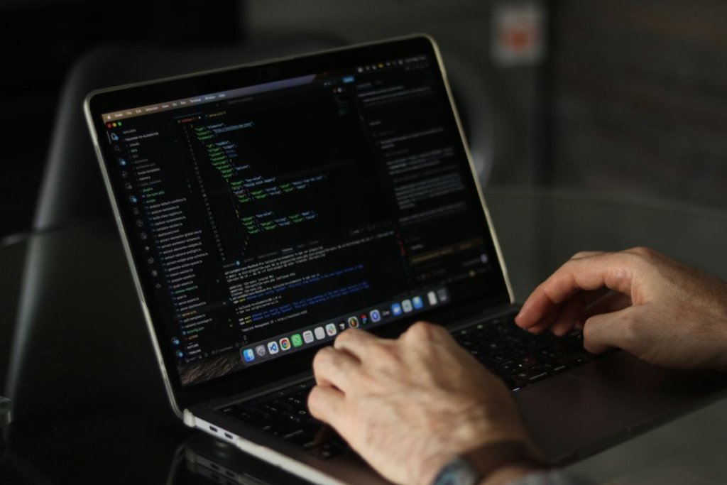 a person using their computer for research.